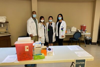AUHS School of Pharmacy & College Medical Center Administer COVID Vaccines